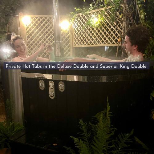 a man and a woman in a bath tub at Bridleway Bed & Breakfast in Lincoln