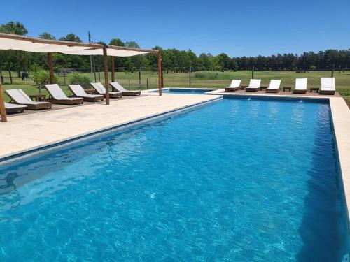 Πισίνα στο ή κοντά στο Complejo Kayen - San Pedro Golf Club