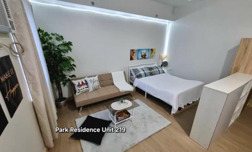 PARK RESIDENCE Unit 219, SM City Santa Rosa, Laguna, by SMDCにあるベッド