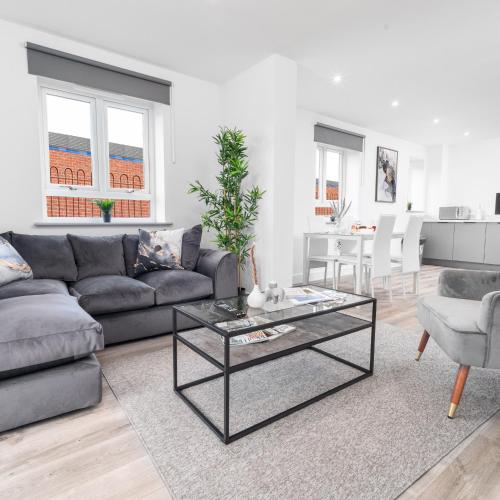 Et opholdsområde på Stylish 2 Bedroom Apartment - Balcony - Parking - Fast WIFI - 3MC