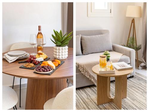 a table with a plate of fruit and a bottle of wine at Sanders Paros Gardens in Molos Parou