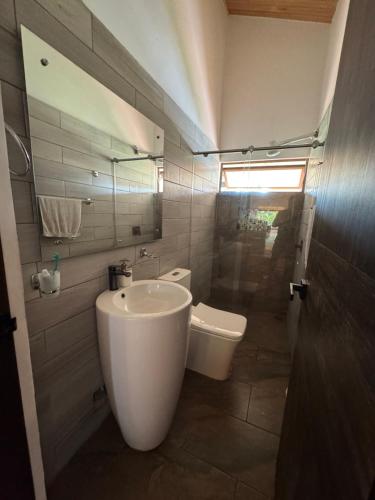 Koupelna v ubytování Milagros km30