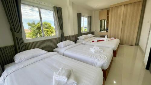 Ένα ή περισσότερα κρεβάτια σε δωμάτιο στο Chillax Poolvilla Songkhla