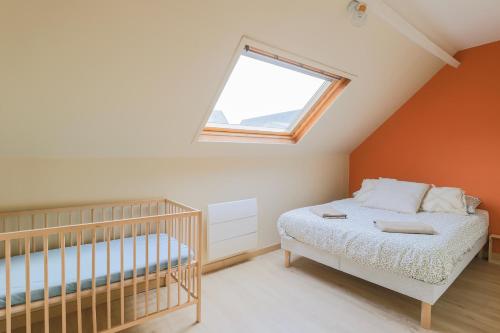 Ένα ή περισσότερα κρεβάτια σε δωμάτιο στο Le Berlingot