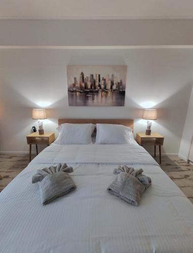 Ένα ή περισσότερα κρεβάτια σε δωμάτιο στο Casa Napie Ioannina