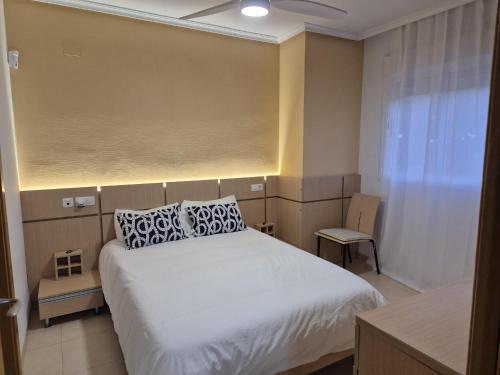 Postel nebo postele na pokoji v ubytování Apartamento en magic world Oropesa del mar