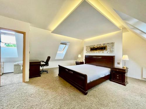 Postel nebo postele na pokoji v ubytování Mezonet Tatry