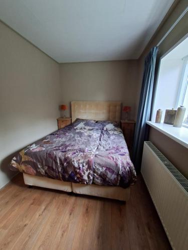 Ένα ή περισσότερα κρεβάτια σε δωμάτιο στο De Kalverstal