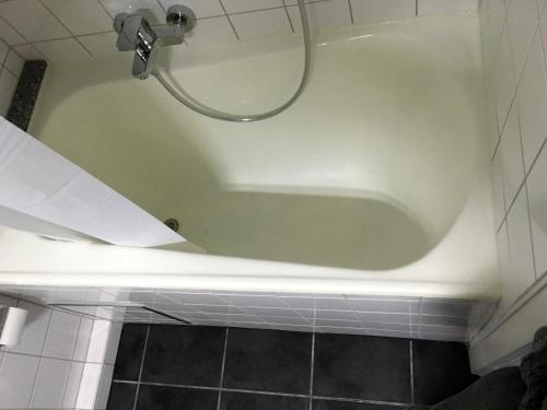 Bilik mandi di Arcaden Apartment