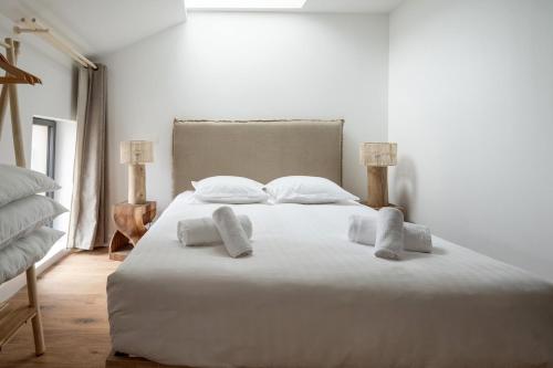 Ένα ή περισσότερα κρεβάτια σε δωμάτιο στο Villa Ninon Disneyland