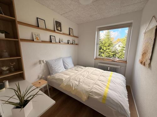 Ένα ή περισσότερα κρεβάτια σε δωμάτιο στο Cozy, totally renovated apartment, sleeps 6