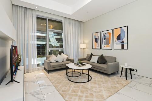 Relax in Comfort with Modern Amenities, Steps from Burj Khalifa and Dubai Mall