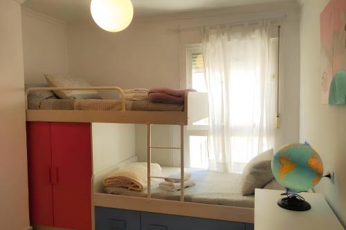 Postel nebo postele na pokoji v ubytování Comfortable Apartment In The Center