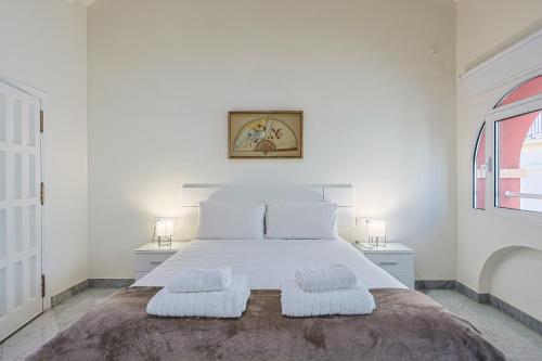 Ένα ή περισσότερα κρεβάτια σε δωμάτιο στο Casa Palacio Guiomar by SHS