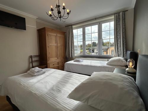 Postel nebo postele na pokoji v ubytování Dolce Villa Pool and Wellness