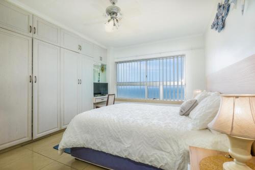 Postel nebo postele na pokoji v ubytování Oceanview Holiday Apartments