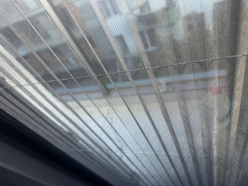 a view of a window with white curtains at NR1 Pansiyon in Canakkale