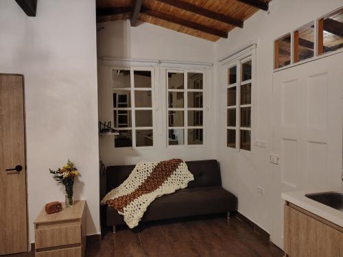 Χώρος καθιστικού στο Herencia Colonial Glamping