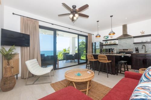 TV a/nebo společenská místnost v ubytování Seahorse Escape-apartment #3 condo