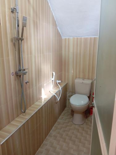 Koupelna v ubytování H&M Resort Arugambay