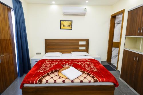 Postel nebo postele na pokoji v ubytování Syrus Hospitality