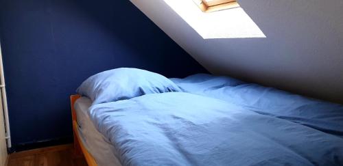 Postel nebo postele na pokoji v ubytování Doppelzimmer an der Pleiße, zwischen zwei Seen