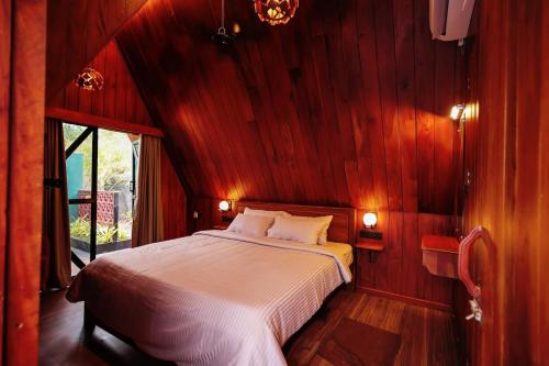 Postel nebo postele na pokoji v ubytování Royal Empire Resort