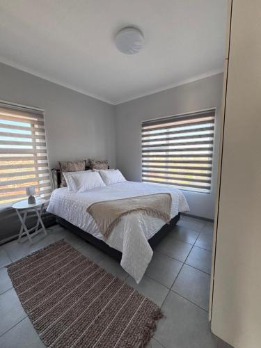 Ένα ή περισσότερα κρεβάτια σε δωμάτιο στο 36 Villa Pirogue - Home away from home