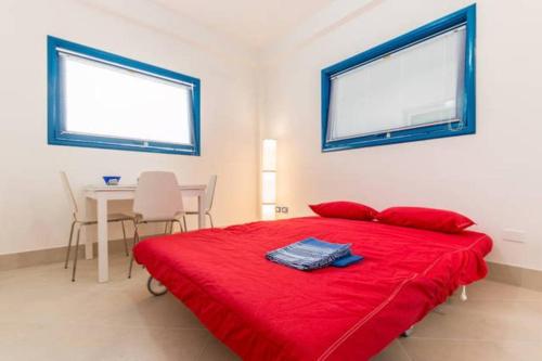 Posteľ alebo postele v izbe v ubytovaní Bilocale Scoglitti nei luoghi di Montalbano