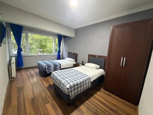 Ένα ή περισσότερα κρεβάτια σε δωμάτιο στο Kılıç AirPort otel