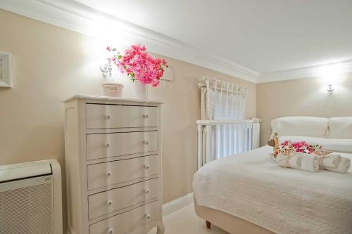 Postel nebo postele na pokoji v ubytování Charming and Cozy House