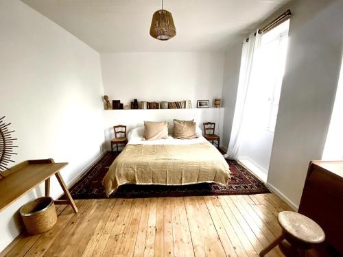 Postel nebo postele na pokoji v ubytování Sunny 3BR Apt