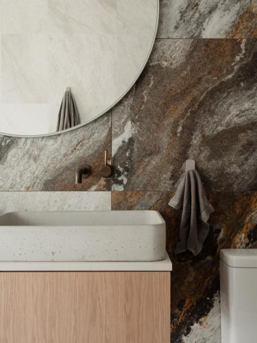 a bathroom with a sink and a mirror at 8 Paddocks Chalet Four in Cowaramup