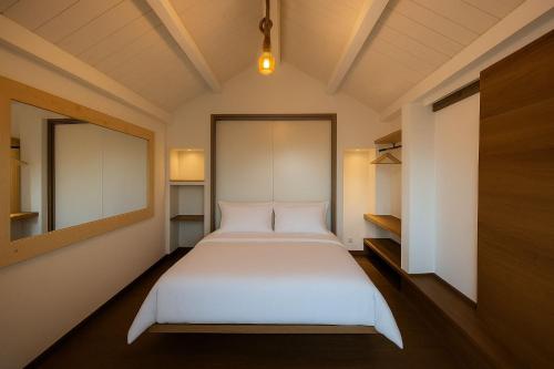 Postel nebo postele na pokoji v ubytování Tenuta Rurale Luxury&Nature