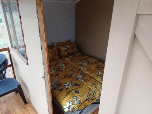 Postel nebo postele na pokoji v ubytování Shumba Camping Site