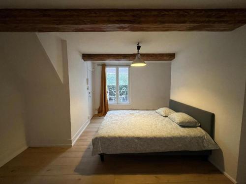 Postel nebo postele na pokoji v ubytování Nice Flat Grand Place