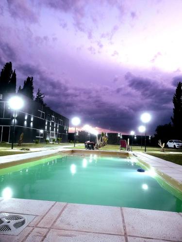 Swimmingpoolen hos eller tæt på El Atardecer Departamentos