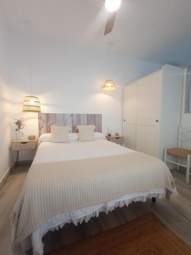 Postel nebo postele na pokoji v ubytování El Altozano N4