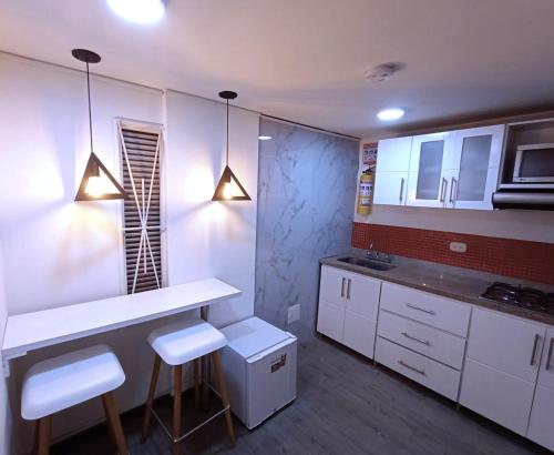 Hotel Boutique CGH Aeropuertoにあるキッチンまたは簡易キッチン