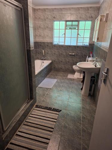 Koupelna v ubytování Guesthouse at Lucia