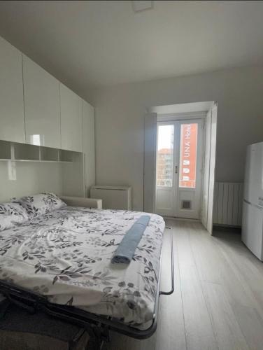 Ένα ή περισσότερα κρεβάτια σε δωμάτιο στο muratori prime