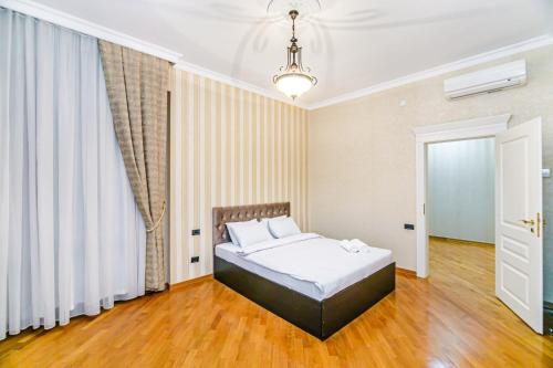 מיטה או מיטות בחדר ב-Apartment STEL