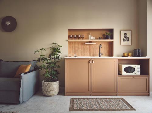 Η κουζίνα ή μικρή κουζίνα στο Melpomeni House