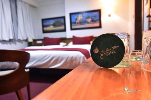 Ένα ή περισσότερα κρεβάτια σε δωμάτιο στο La Rose Bleue