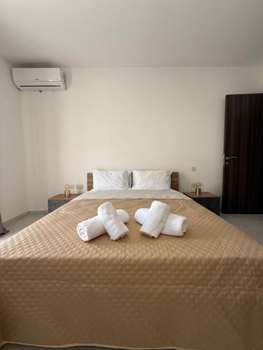 Postel nebo postele na pokoji v ubytování Hakuna Matata