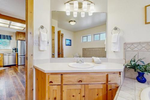 a bathroom with a sink and a mirror at Boat House in Soda Springs