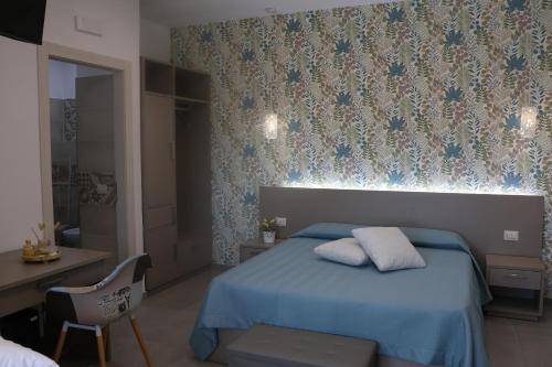 Postel nebo postele na pokoji v ubytování Agriturismo Green Planet