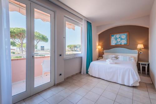 Postel nebo postele na pokoji v ubytování Hotel Eden