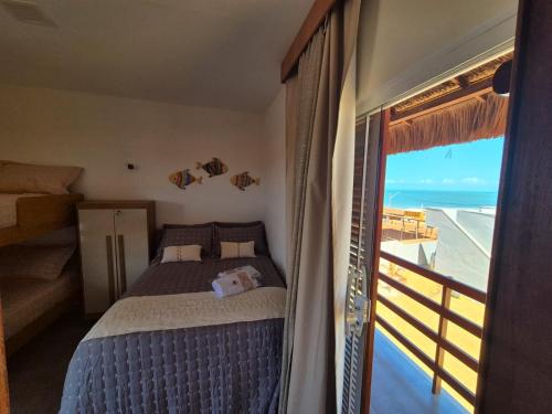 Postel nebo postele na pokoji v ubytování Pousada Vista do Pôr do Sol