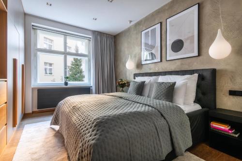 Ένα ή περισσότερα κρεβάτια σε δωμάτιο στο Stylish Apartment in Prague's Historic Centre